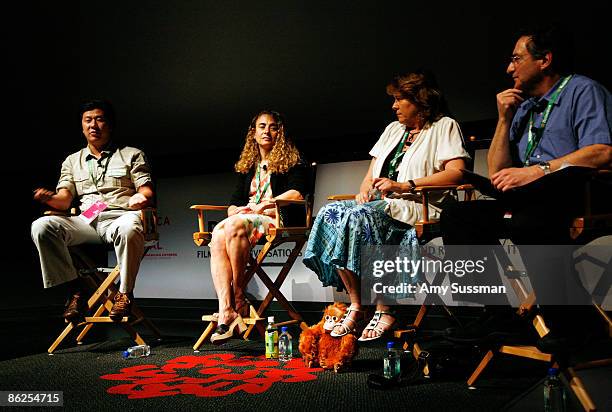 Of Carbon Conservation Dorjee Sun, Elisabeth Rosenthal of the New York Times, director Cathy Henkel, and NPR's Ira Flatow speaks during the screening...