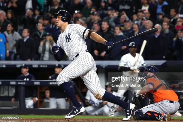 Aaron Judge of the New York Yankees hits a double during the eighth inning against the Houston Astros in Game Four of the American League...