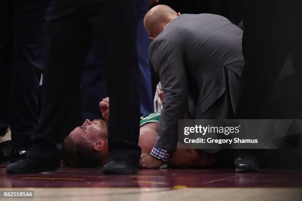 Gordon Hayward of the Boston Celtics is sits on the floor after being injured while playing the Cleveland Cavaliers at Quicken Loans Arena on October...
