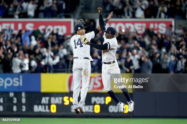 Starlin Castro and Didi Gregorius of the New York Yankees celebrate after defeating the Houston Astros in Game Four of the American League...