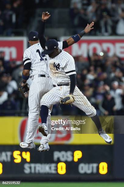 Starlin Castro and Didi Gregorius of the New York Yankees celebrate after defeating the Houston Astros in Game Four of the American League...