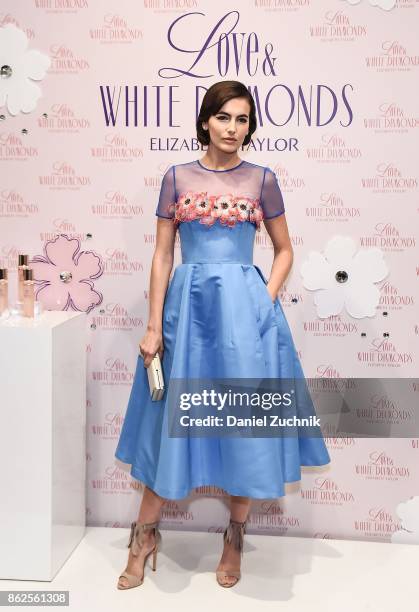 Camilla Belle poses during the launch of Love & White Diamonds Fragrance at Academy Mansion on October 17, 2017 in New York City.