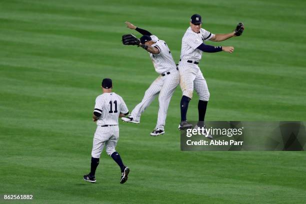 Aaron Hicks and Aaron Judge of the New York Yankees celebrate after defeating the Houston Astros in Game Four of the American League Championship...