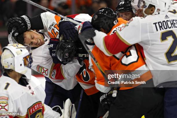 Alex Petrovic of the Florida Panthers is shoved by Wayne Simmonds of the Philadelphia Flyers as players push during the second period at Wells Fargo...