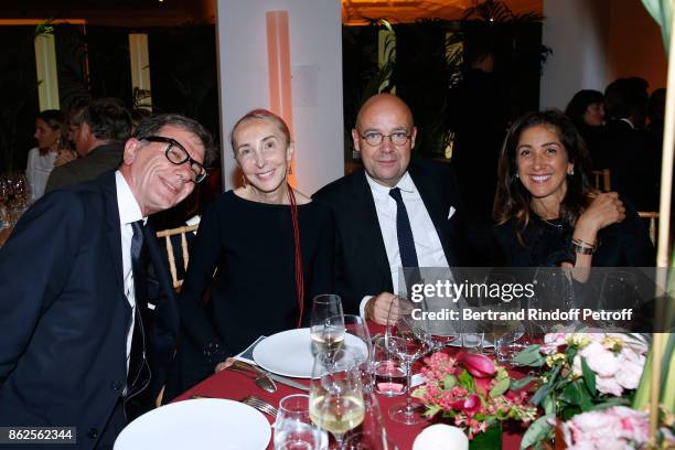 Serge Lasvignes, Carla Sozzani and Director of 'Musee d'Art Moderne de la Ville de Paris', Fabrice Hergott attend the "Societe des Amis du Musee...