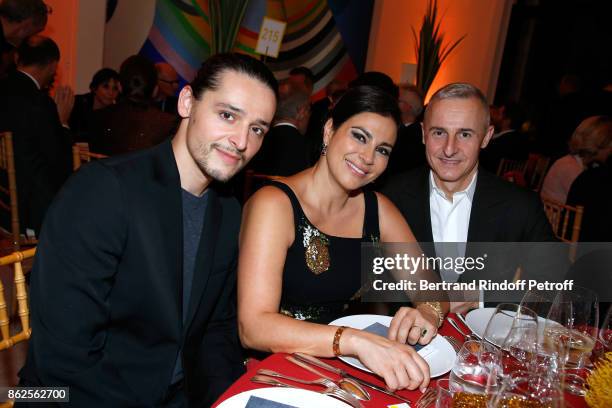 Olivier Theyskens, Miss Alexandre Mouradian and Herve van der Straeten attend the "Societe des Amis du Musee d'Art Moderne de la Ville de Paris"...