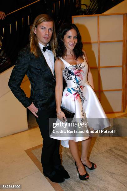Stylist Christophe Guillarme and actress Fabienne Carat attend the 25th "Gala de l'Espoir" at Theatre des Champs-Elysees on October 17, 2017 in...