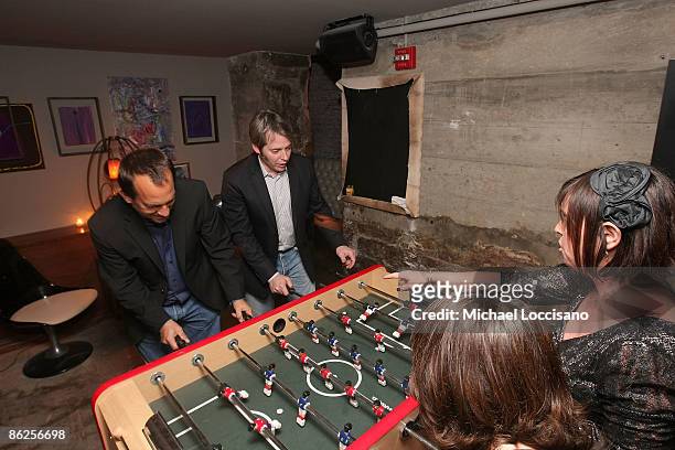 Director Joshua Goldin, actor Matthew Broderick, associate producer Amanda Marshall, and producer Miranda Bailey play foosball during the after party...