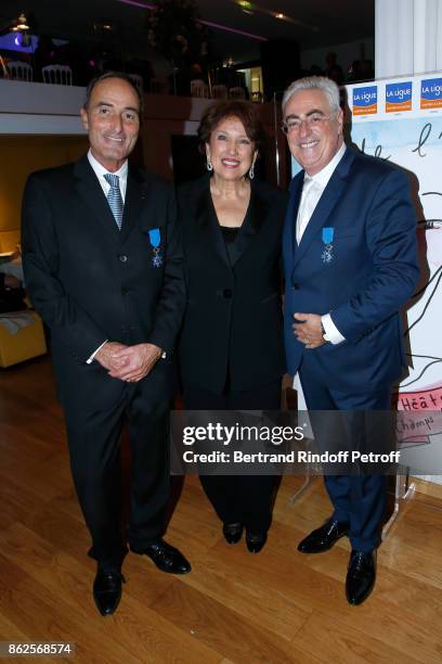 Herve Michel-Dansac and Jean-Michel Aubrun received the insignia of "Chevalier dans l'Ordre National du Merite" from Roselyne Bachelot Narquin during...