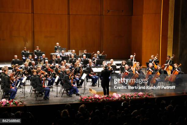 Bandmaster Francois Boulanger performs with the Symphonic Orchestra of the "Garde Republicaine" during the 25th "Gala de l'Espoir" at Theatre des...