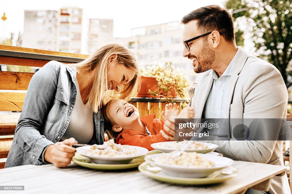 Family enjoying restaurant