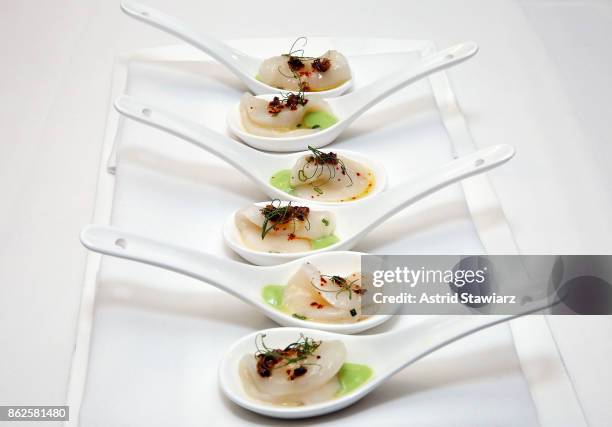 Scallop crudo is served during the Marc Forgione and Jorge Espinoza dinner presented by Ferguson Bath, Kitchen & Lighting Gallery at Scarpetta on...