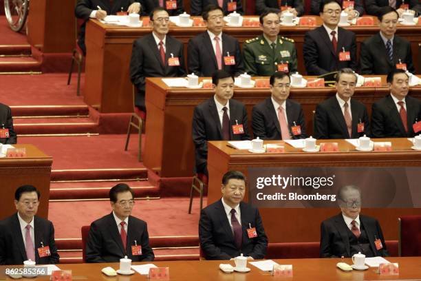 Zhang Dejiang, chairman of the Standing Committee of the National People's Congress, front row from left, Hu Jintao, China's former president, Xi...