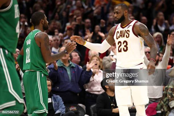 LeBron James of the Cleveland Cavaliers and Kyrie Irving of the Boston Celtics shake hands after a Cavaliers 102-99 victory at Quicken Loans Arena on...