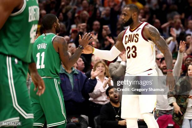 LeBron James of the Cleveland Cavaliers and Kyrie Irving of the Boston Celtics shake hands after a Cavaliers 102-99 victory at Quicken Loans Arena on...
