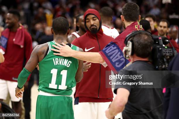 Smith of the Cleveland Cavaliers and Kyrie Irving of the Boston Celtics shake hands after a Cavaliers 102-99 victory at Quicken Loans Arena on...