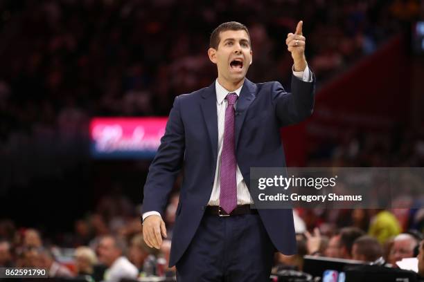 Head coach Brad Stevens of the Boston Celtics yells from the bench while playing the Cleveland Cavaliers at Quicken Loans Arena on October 17, 2017...