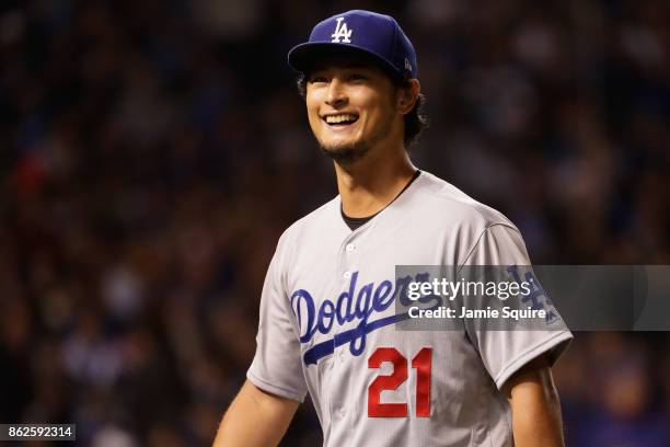 Yu Darvish of the Los Angeles Dodgers reacts after the sixth inning against the Chicago Cubs during game three of the National League Championship...