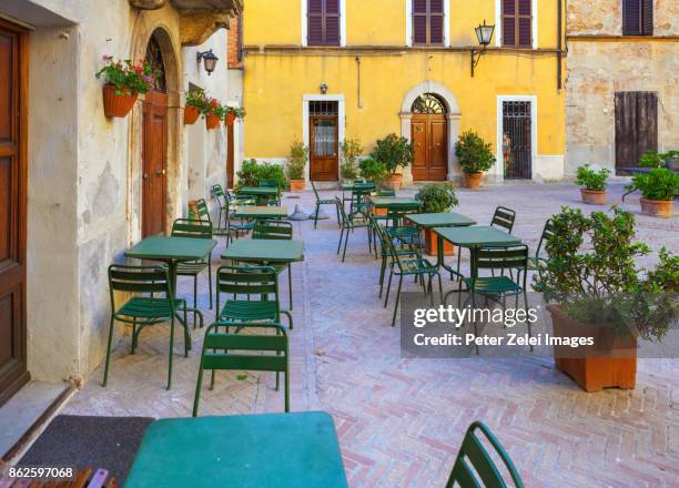 town square in italy with restaurant tables - italian cafe culture stock pictures, royalty-free photos & images