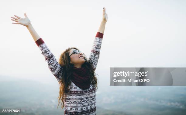 free and happy autumn girl - november weather stock pictures, royalty-free photos & images