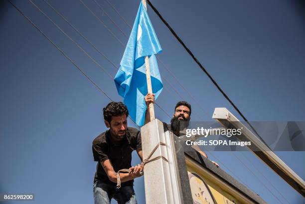 We are putting up our flags now that the kurds have gone. We took all theirs down. Since last night we can live peacefully, it will be a better life...