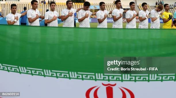 Players of Iran sing their national anthem prior to the FIFA U-17 World Cup India 2017 Round of 16 match between Iran and Mexico at Pandit Jawaharlal...