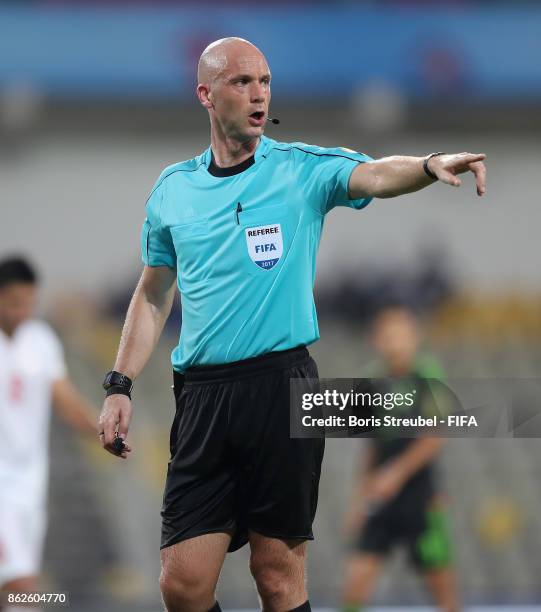 Referee Anthony Taylor gestures during the FIFA U-17 World Cup India 2017 Round of 16 match between Iran and Mexico at Pandit Jawaharlal Nehru...