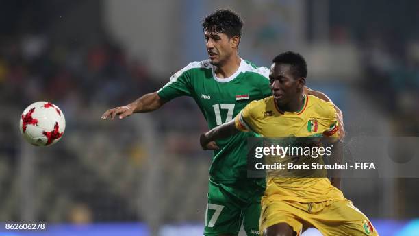 Mohammed Ali of Iraq battles for the ball with Hadji Drame of Mali during the FIFA U-17 World Cup India 2017 Round of 16 match between Mali and Iraq...