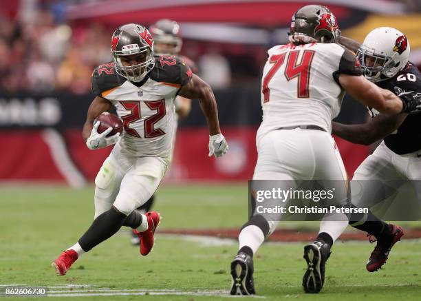 Running back Doug Martin of the Tampa Bay Buccaneers rushes the football against the Arizona Cardinals during the second half of the NFL game at the...