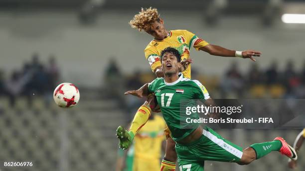 Mohammed Ali of Iraq jumps for a header with Salam Jiddou of Mali during the FIFA U-17 World Cup India 2017 Round of 16 match between Mali and Iraq...