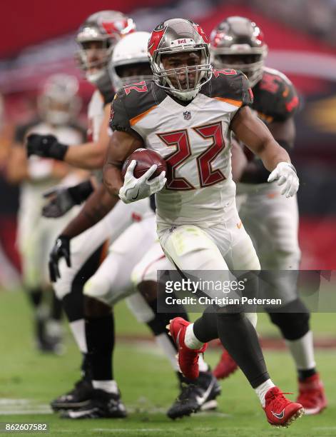 Running back Doug Martin of the Tampa Bay Buccaneers rushes the football against the Arizona Cardinals during the second half of the NFL game at the...