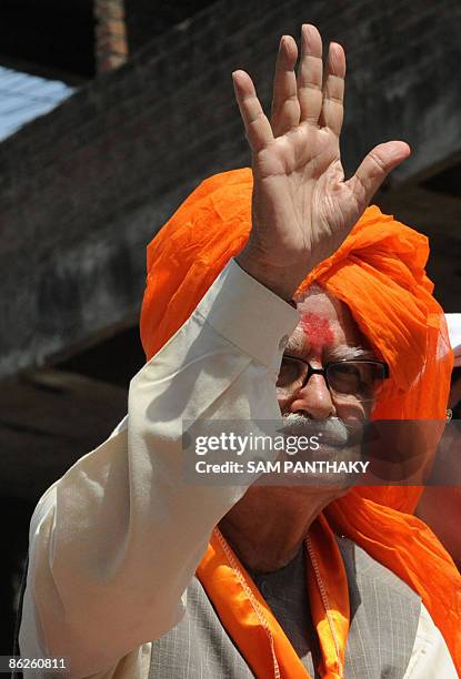 Indian opposition Bharatiya Janata Party prime ministerial candidate and Gandhinagar constituency candidate L. K. Advani greets people during a road...