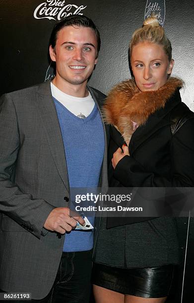 Personality James Tobin and guest attend the Diet Coca-Cola Little Black Dress Show on the catwalk at the Overseas Passenger Terminal, Circular Quay...