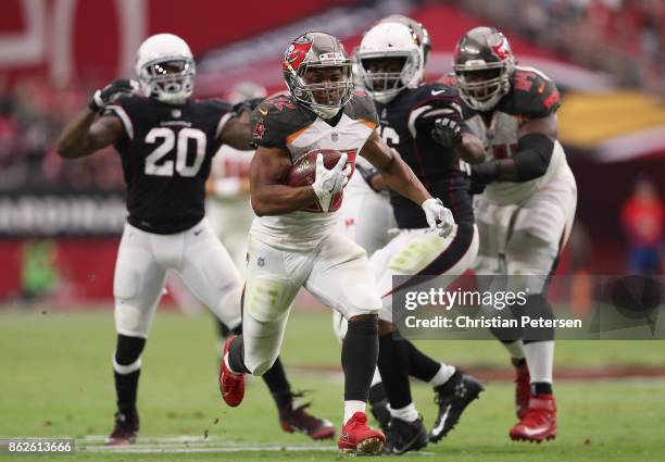 Running back Doug Martin of the Tampa Bay Buccaneers rushes the football against the Arizona Cardinals during the second half of the NFL game at the...