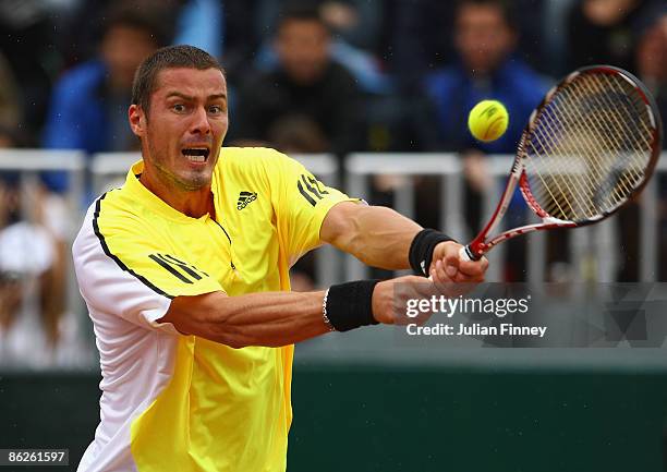 Marat Safin of Russia plays a backhand in his match against Tommy Robredo of Spain during day two of the Foro Italico Tennis Masters on April 28,...