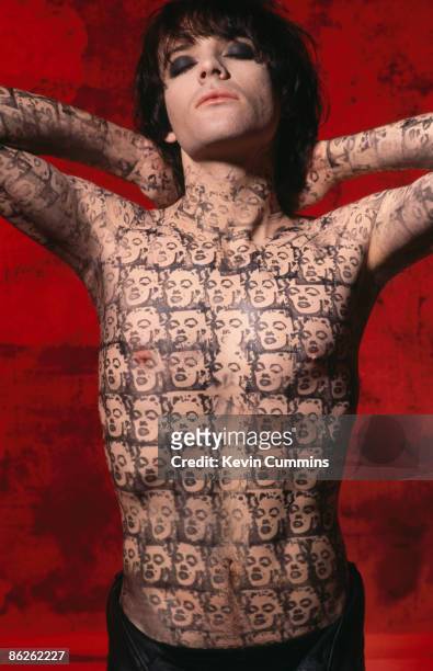Guitarist and songwriter Richey James Edwards of Welsh rock group Manic Street Preachers, 23rd September 1992. He is wearing a temporary tattoo of...