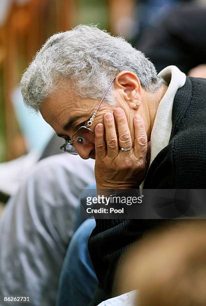 An Israeli woman attends Memorial Day at Mount Herzl on April 28, 2009 in Jerusalem, Israel. Israel's Memorial Day pays tribute to civilian victims...