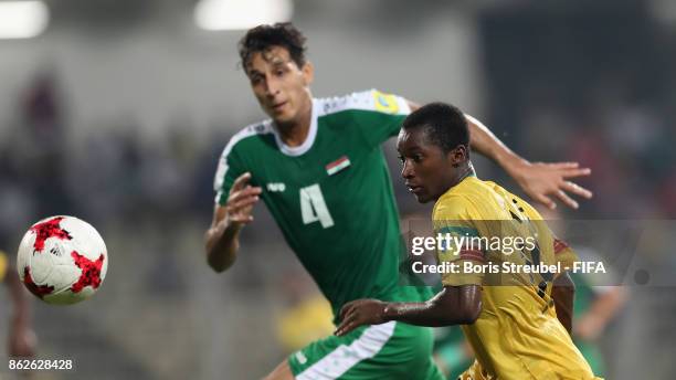 Ibrahim Kane of Mali is challenged by Maytham Jabbar of Iraq during the FIFA U-17 World Cup India 2017 Round of 16 match between Mali and Iraq at...