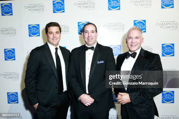 Josh Elliot, Dan Latore and Sam Champion during the Skin Cancer Foundation's Champions for Change Gala at Cipriani 25 Broadway on October 17, 2017 in...