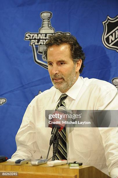 Peter Tortotella, head coach of the New York Rangers, talks to the media after Game Five of the Eastern Conference Quarterfinals of the 2009 NHL...