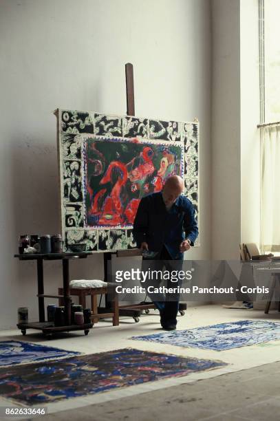 Belgian painter Pierre Alechinsky at work in his workshop on August 7, 1995 in Provence, France.