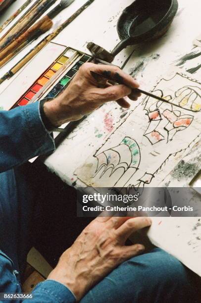 Belgian painter Pierre Alechinsky at work in his workshop on August 7, 1995 in Provence, France.