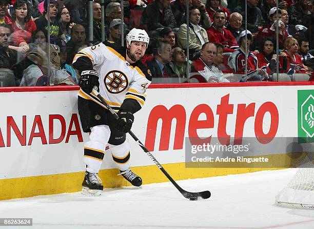 Mark Stuart of the Boston Bruins skates against the Montreal Canadiens during Game Four of the Eastern Conference Quarterfinal Round of the 2009...