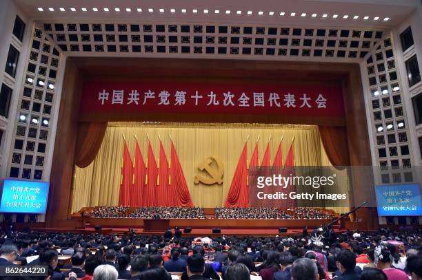 Delegates attend the opening ceremony of the 19th National Congress of the Communist Party of China at Great Hall of the People on October 18, 2017...