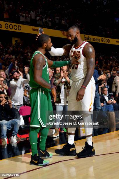 LeBron James of the Cleveland Cavaliers and Kyrie Irving of the Boston Celtics talk after the game on October 17, 2017 at Quicken Loans Arena in...