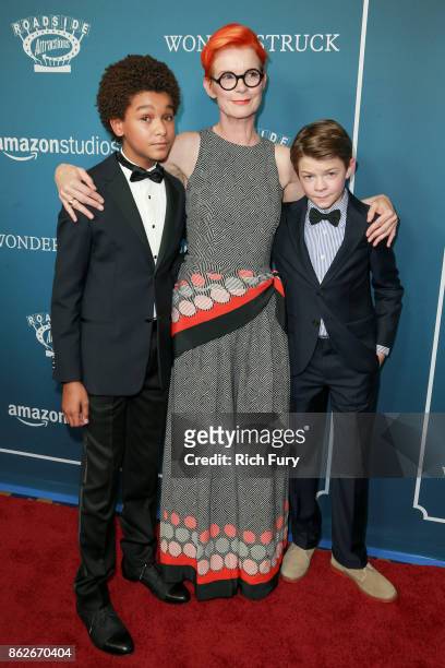 Actor Jaden Michael, costume designer/executive producer Sandy Powell and actor Oakes Fegley attend the premiere of Roadside Attractions'...