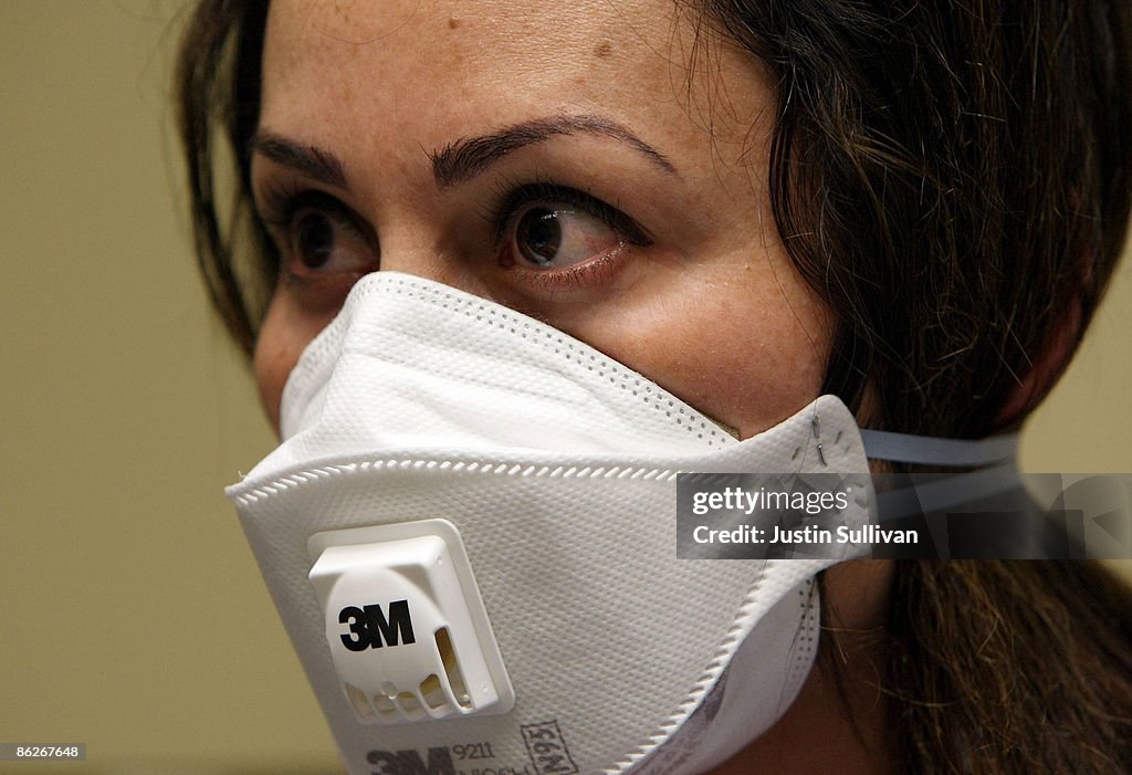 Health Clinic Workers Train Staff For Dealing With Swine Flu Testing