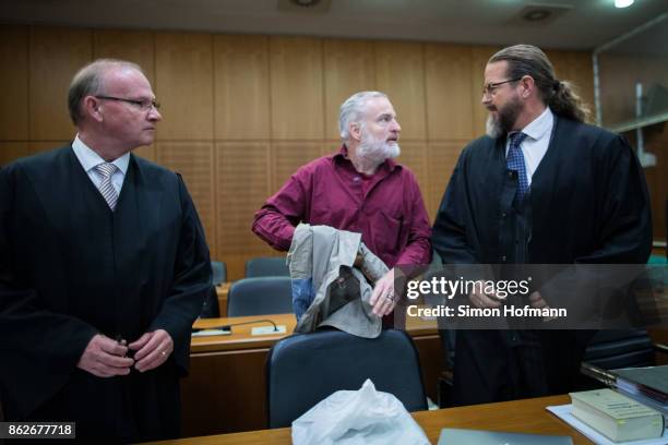 Daniel M. Arrives with his lawyers Hannes Linke and Robert Kain for his trial on charges of spying for the Swiss government on October 18, 2017 in...