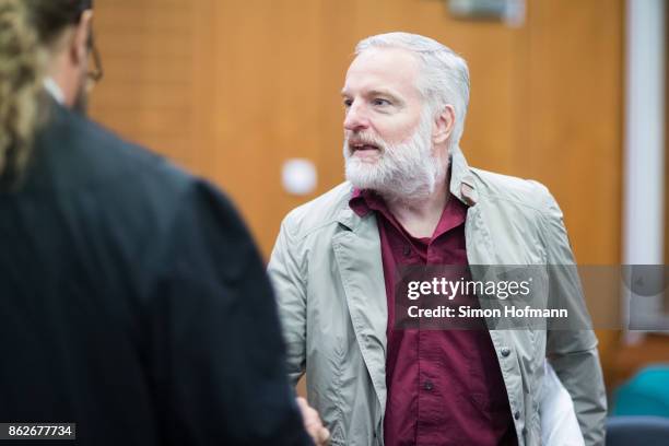 Daniel M. Arrives for his trial on charges of spying for the Swiss government on October 18, 2017 in Frankfurt, Germany. German authorities accuse...