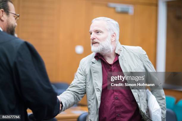 Daniel M. Arrives for his trial on charges of spying for the Swiss government on October 18, 2017 in Frankfurt, Germany. German authorities accuse...